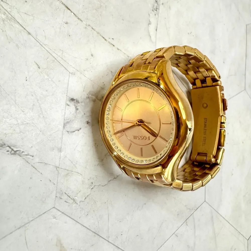Fossil Women’s Gold Tone Quartz Watch Rose Gold Tone Dial Rhinestone Bracelet